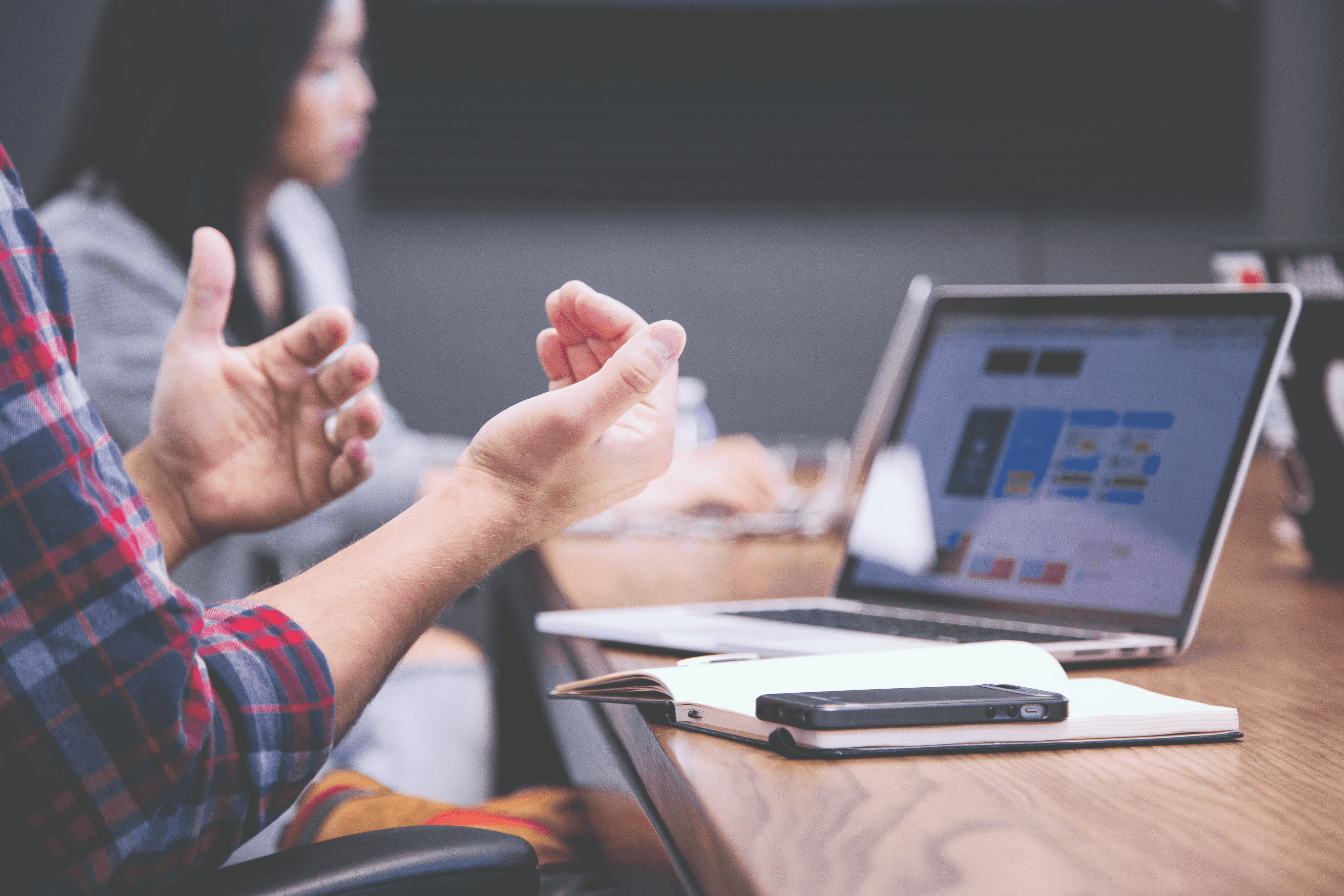 Picture of people working in a team at the company